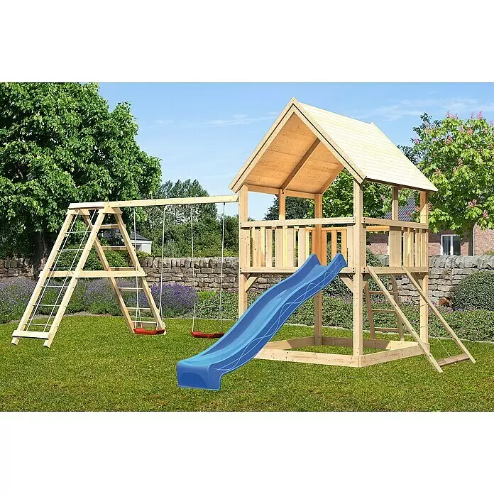 Karibu Kinderspielturm Luis Set 22 - L x B x H: 264 x 508 x 345 cm, Natur/Blau - Ein großer Holzspielturm mit blauer Rutsche und roten Schaukeln auf grünem Rasen im Garten.