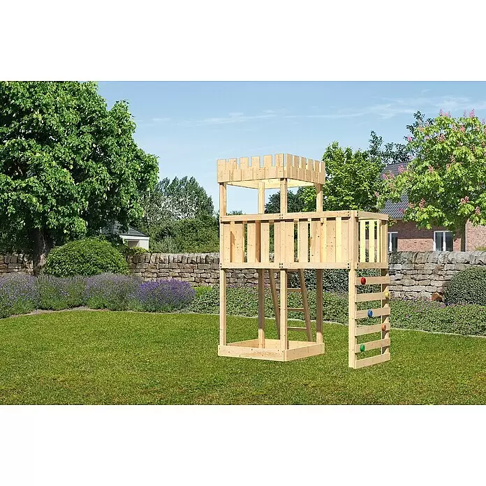 Karibu Kinderspielturm Ritterburg Löwenherz Set 26 - L x B x H: 107 x 214 x 259,5 cm, Natur - Hölzerner Spielturm mit Zinnen und einer Kletterwand mit bunten Griffen.