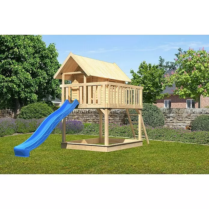 Karibu Kinderspielturm Fidel Set 3 - L x B x H: 243 x 198 x 329,5 cm, Natur/Blau - Holzspielhaus mit blauer Rutsche und integriertem Sandkasten in einer Gartenumgebung.