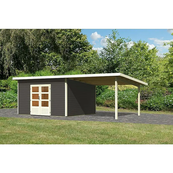 Karibu Gartenhaus Northeim 5 - Außenmaß inkl. Dachüberstand (B x T): 724 x 393 cm, Holz, Terragrau, Mit Seitendach - Ein modernes Gartenhaus mit Carport-Anbau. Das Haus hat dunkle Holzverkleidung und helle Türrahmen, während der Carport auf hellen Säulen steht.