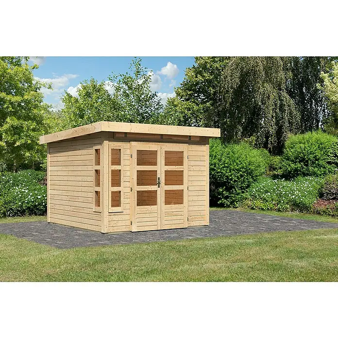 Karibu Gartenhaus Kastorf 6 - Außenmaß inkl. Dachüberstand (B x T): 305 x 303 cm, Holz, Natur - Modernes Gartenhaus mit Holzwänden und Doppeltür auf gepflastertem Untergrund, umgeben von Grün. Ideal für die Aufbewahrung von Gartengeräten.