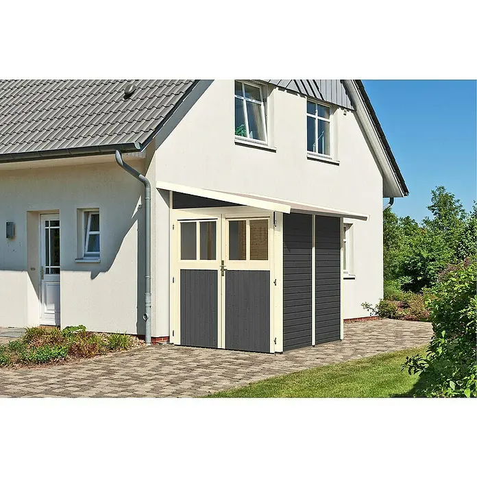 Karibu Gartenhaus Wandlitz 2 - Außenmaß inkl. Dachüberstand (B x T): 200 x 232 cm, Holz, Terragrau - Ein Gartenhaus mit einem grauen Dach, das an ein weißes Haus angebaut ist. Der Eingang des Hauses ist zweifarbig grau/weiß.