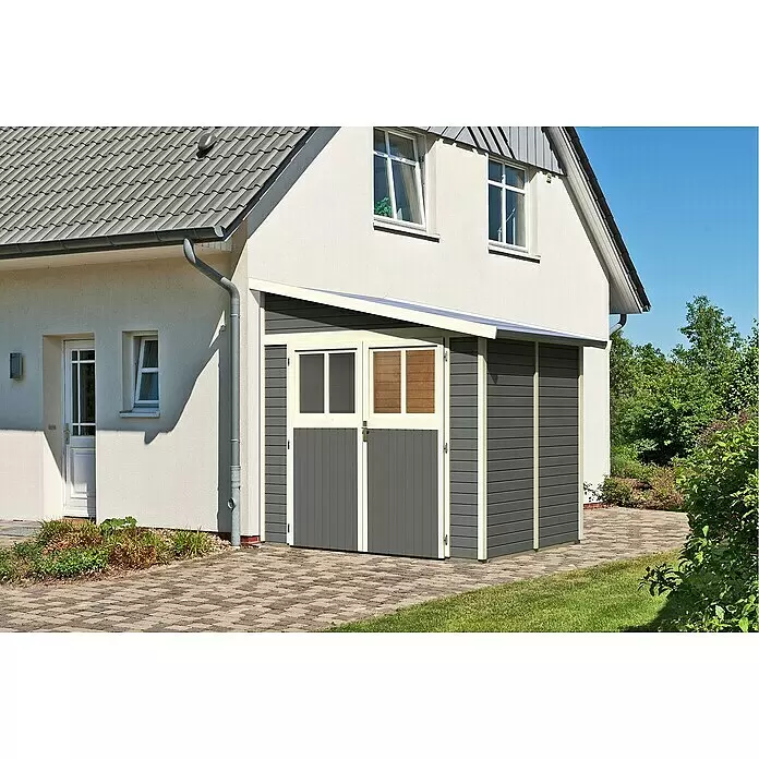 Karibu Gartenhaus Bomlitz 2 - Außenmaß inkl. Dachüberstand (B x T): 255 x 232 cm, Holz, Terragrau - Dunkelgrauer Gartenschuppen mit heller Verkleidung und transparentem Dach, am Haus. Zwei Türen, eine mit Fenster, eine mit Holzlamellen.