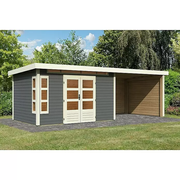 Karibu Gartenhaus Kastorf 7 - Außenmaß inkl. Dachüberstand (B x T): 702 x 273 cm, Holz, Terragrau, Mit Seitendach, Rück- und Seitenwand - Moderner Gartenschuppen mit Carport, dunkelgraue Verkleidung, helle Holzverkleidung und Doppeltüren, auf gepflastertem Untergrund.