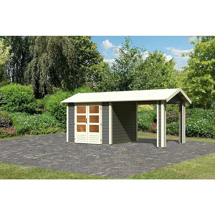 Karibu Gartenhaus TheresAußenmaß inkl. Dachüberstand (B x T): 528 x 288 cm, Holz, Terragrau - Diese Aufnahme zeigt ein Gartenhaus mit Carport Anbau in Holzoptik. Das Gartenhaus bietet Stauraum und Schutz für Gartengeräte.