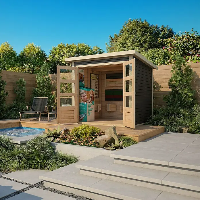 Karibu Gartenhaus Stockach 2Außenmaß inkl. Dachüberstand (B x T): 212 x 210 cm, Holz, Terragrau - Ein modernes Saunahaus mit offenstehenden Türen, eingebettet in einen Garten mit Pool, lädt zur Entspannung ein. Die Holzkonstruktion strahlt Wärme aus.