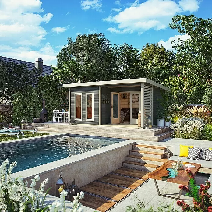 Karibu Gartenhaus Radeburg 5 - Außenmaß inkl. Dachüberstand (B x T): 560 x 422 cm, Holz, Terragrau - Modernes dunkelgraues Gartenhaus mit hellem Holzinterieur auf einer Holzterrasse neben einem Pool in einem Garten.