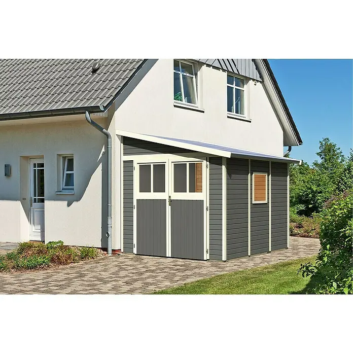 Karibu Gartenhaus Bomlitz 3 - Außenmaß inkl. Dachüberstand (B x T): 255 x 301 cm, Holz, Terragrau - Das Bild zeigt ein modernes Gartenhaus mit Doppeltür und kleinem Vordach an einem Wohnhaus. Das Haus ist in Grau und Weiß gehalten.