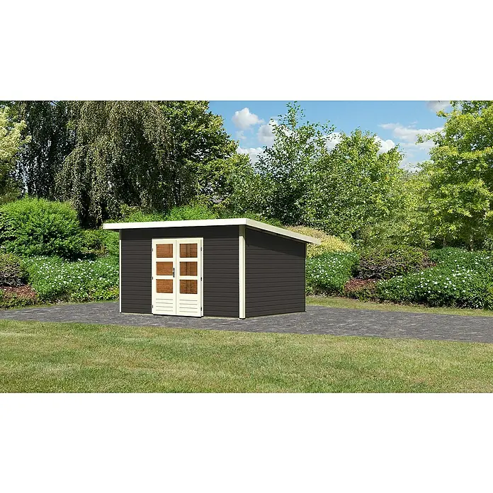 Karibu Gartenhaus Northeim 4 - Außenmaß inkl. Dachüberstand (B x T): 406 x 331,5 cm, Holz, Terragrau - Ein modernes Gartenhaus in dunkler Farbe mit weißen Akzenten und Doppeltür steht auf einer gepflasterten Fläche inmitten eines Gartens.