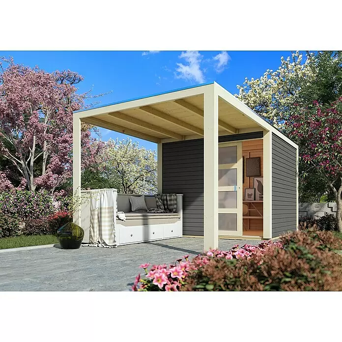 Karibu Gartenhaus Qubic 1 - Außenmaß inkl. Dachüberstand (B x T): 485 x 246 cm, Holz, Terragrau, Mit Seitendach - Moderner Gartenpavillon mit Schuppen aus hellem Holz und dunkelgrauer Verkleidung, mit Daybed und Innenarbeitsplatz im blühenden Garten.