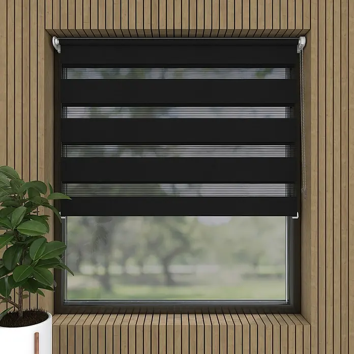Doppelrollo BasicB x H: 75 x 150 cm, Schwarz - Eine Nahaufnahme eines Fensters mit schwarzen Doppelrollos, die für Privatsphäre und Lichtsteuerung in einem stilvollen Interieur sorgen.