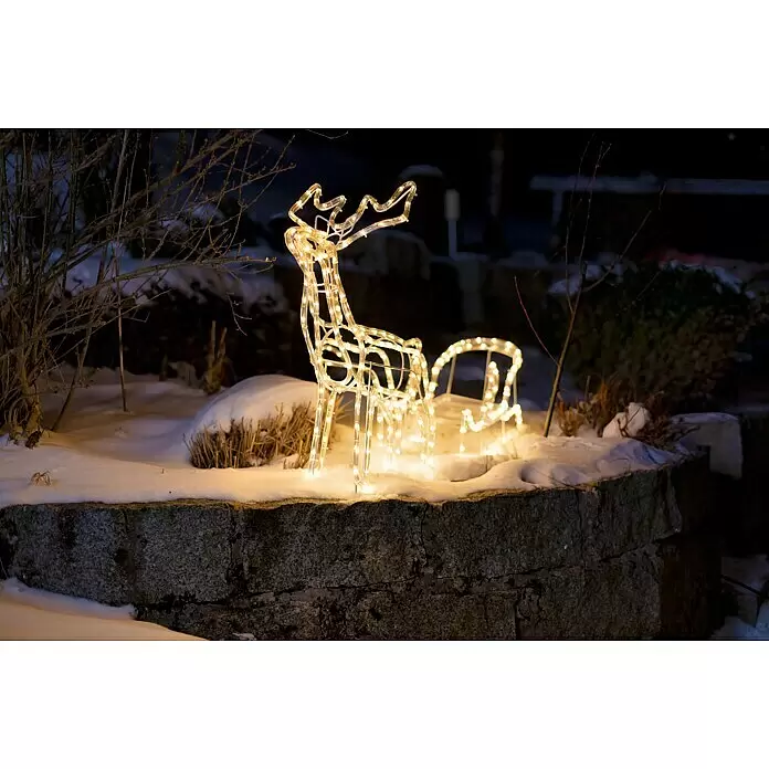 Tween Light LED-Lichtschlauch Rentier mit Schlitten - Anwendungsbereich: Außen, Warmweiß - Warmweiße LED-Rentier- und Schlitten-Weihnachtsdekoration im Schnee.