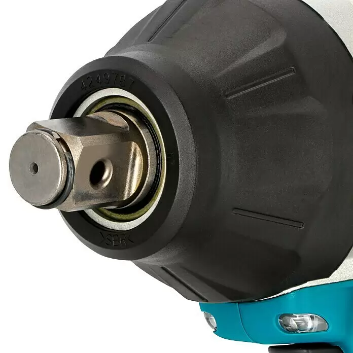 Makita LXT 18V Akku-Schlagschrauber TW1001RTJ - 18 V, 2 Akkus, 5 Ah, 1.700 Nm - Nahaufnahme eines Schlagschraubers mit metallischem Vierkantantrieb und strukturiertem schwarzem Gehäuse mit türkisfarbenen Akzenten.