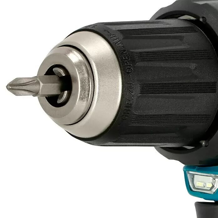 Makita LXT 18V Akku-Bohrschrauber DDF484RTJ - 18 V, 2 Akkus, 5 Ah, 54 Nm - Nahaufnahme eines metallisch-silbernen Bohrfutters mit schwarzem Griff, das einen silbernen Phillips-Bit hält.