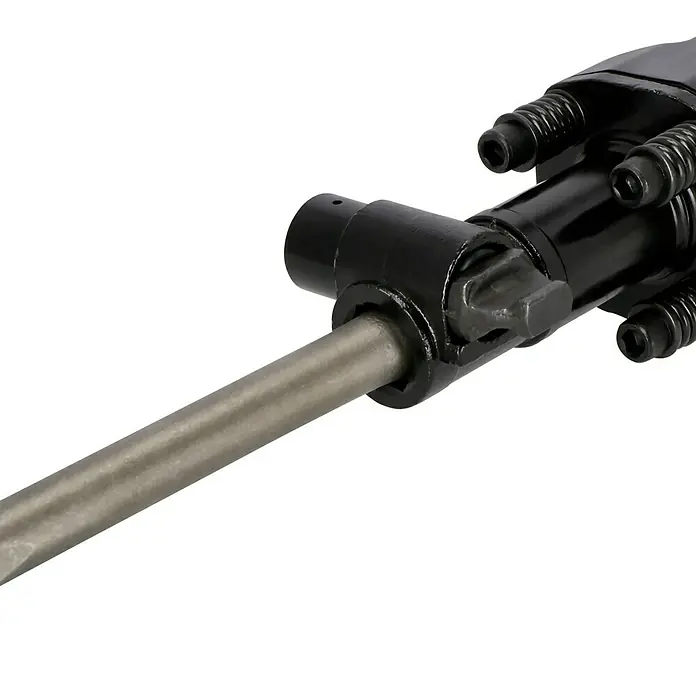 Einhell Professional Martillo demoledor TE-DH 50 - 1.700 W, 50 J, Alojamiento SDS-Hex - Primer plano de un martillo neumático con un cincel, utilizado para trabajos de construcción y demolición.