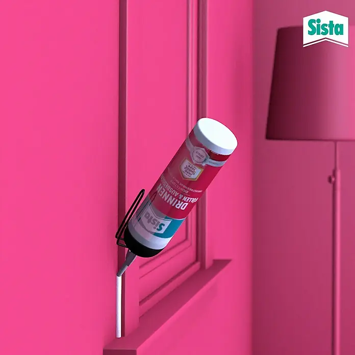 Sista Acryl-Dichtmasse Drinnen - Weiß, 100 ml - Sista Dichtstoff aufgetragen auf eine pinke Fensterbank.