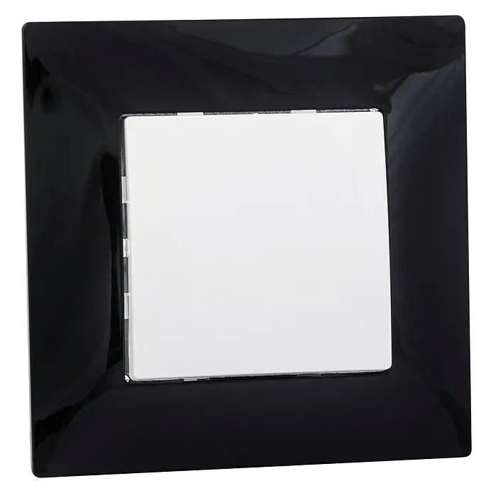 BJC Viva Cruzamiento - Blanco polar, Montaje en superficie - Marco de interruptor negro con inserción blanca. Un elegante interruptor de luz para interiores modernos que combina estilo y funcionalidad.