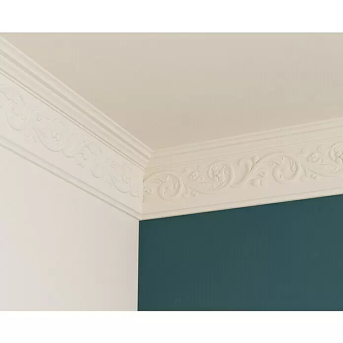 Nmc Decoflair Zierprofil Deckenleiste F18 - 2 m x 69 mm x 148 mm, Hochverdichteter Polyurethanschaum (PU) - Weißes, verziertes Deckenprofil in einer Raumecke, das eine hellbeige Decke mit weißen und dunkelpetrolfarbenen Wänden verbindet.
