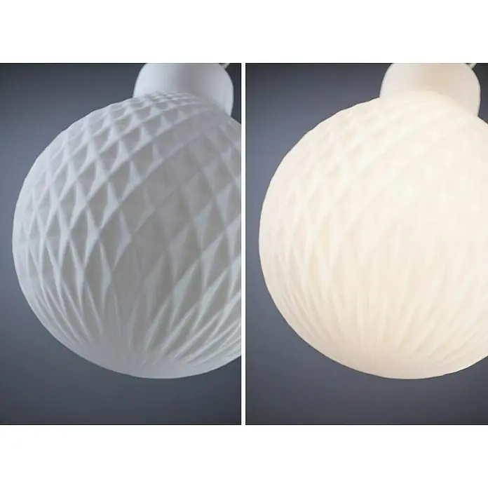 Paulmann LED-Lampe White Lampion - E27, Dimmbar, Warmweiß, 400 lm, 4 W - Weiße Lampe mit geometrischem Muster, einmal unbeleuchtet und einmal beleuchtet, was das Design hervorhebt.