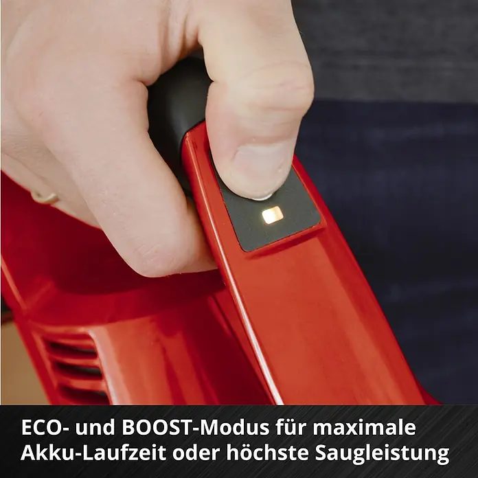 Einhell Power X-Change 18V Akku-Staubsauger TE-SV 18 Li-Solo - 18 V, Ohne Akku, Behältervolumen: 0,6 l - Nahaufnahme eines roten Akku-Staubsaugers mit hervorgehobener ECO- und BOOST-Modus-Taste.