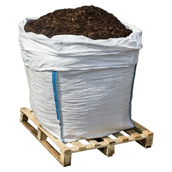 Presto Humus Rindenmulch Bigbag - 1 l, Nadelholzrinde, 10 Millimeter (mm), 20 Millimeter (mm) - Großer, weißer Sack mit Mulch auf einer Palette. Ideal für Gartenarbeit und Landschaftsbau, bietet Schutz und Nährstoffe für Pflanzen.