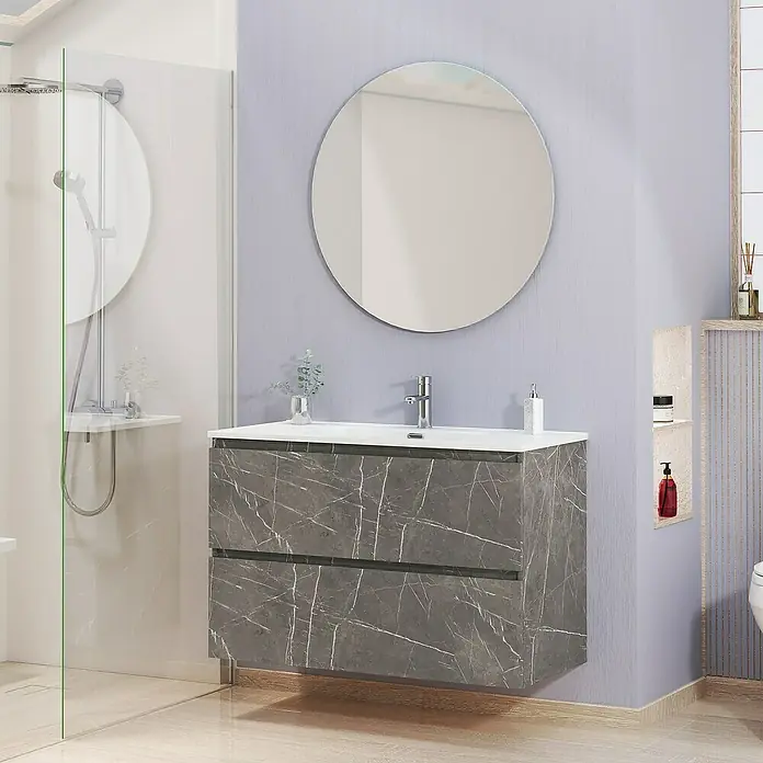 Artysan Conjunto de mueble de baño Kira - Ancho: 100 cm, Gris Piedra, 3 pzs. - Un moderno lavabo de baño con efecto de mármol gris y espejo redondo a juego en una pared lavanda, con grifo cromado.