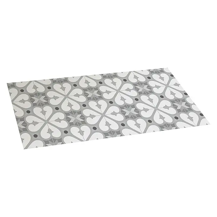 Alfombra de vinilo Croma BCN - Gris, 110 x 50 cm - Primer plano de una alfombra de vinilo rectangular gris y blanca con un estampado floral para un diseño de habitación elegante.