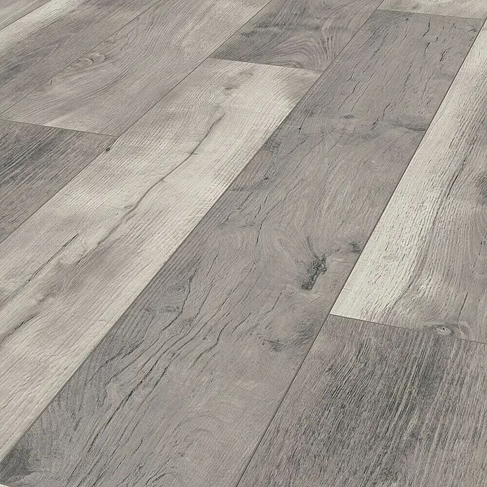 LOGOCLIC Aquaprotect Laminatmuster Tasso Oak - 297 x 245 x 8 mm, Landhausdiele - Nahaufnahme von grauem Laminatboden mit Holzstruktur, ideal für moderne Wohnräume.