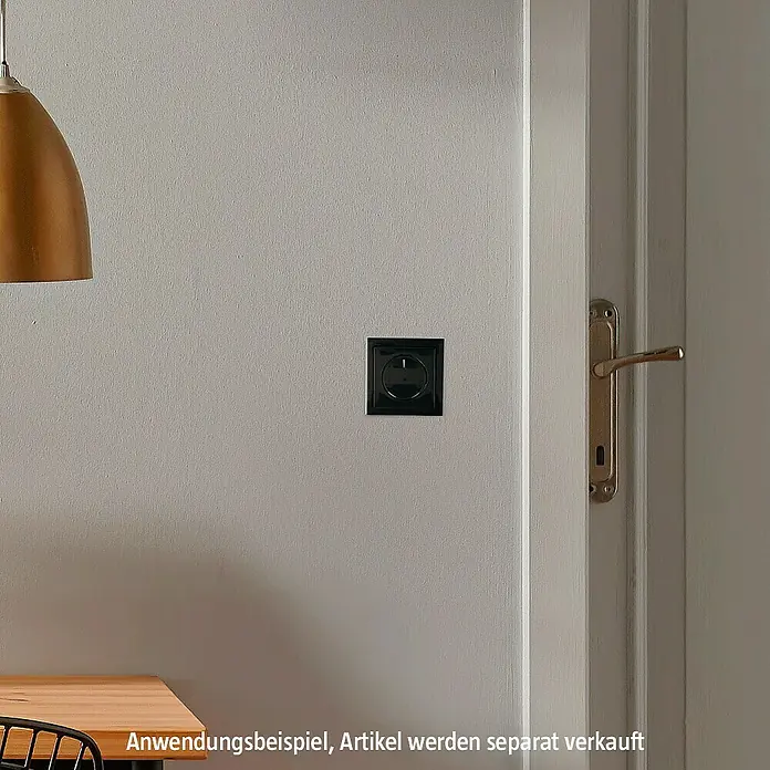 Jung LED-Dimmer 1730 DD - Metall - Schwarze Steckdose an der Wand, ein dezenter Akzent für moderne Innenräume.