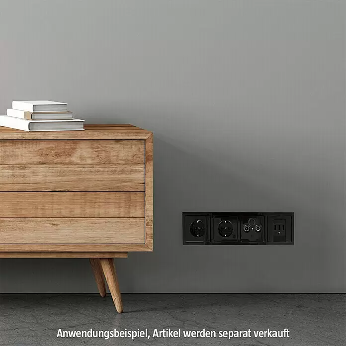 Busch-Jaeger Future Linear Antennenabdeckung 1743-81 - Anthrazit, Glänzend, Kunststoff, Unterputzmontage - Schwarze Unterputz-Steckdosen und Datenanschlüsse neben Holzschrank.