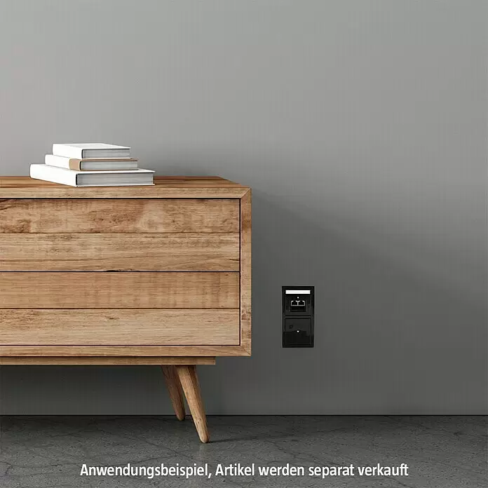 Busch-Jaeger Future Linear UAE-Abdeckung 1803-02-81 - Anthrazit, Kunststoff - Schwarze Wandsteckdose mit Daten-/USB-Anschlüssen, in eine Wand integriert neben einem Holzschrank.