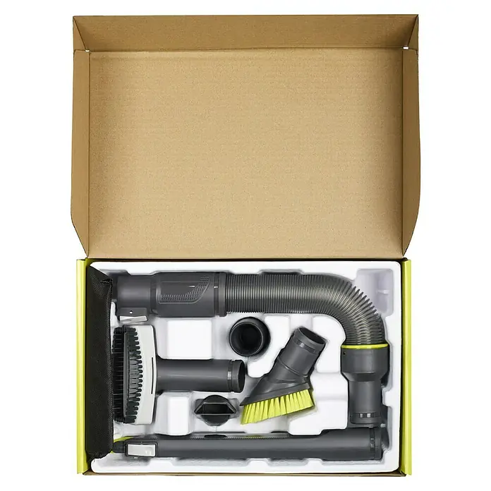 Ryobi Zubehör-Set RAKVA04 - 6 Stk. - Karton mit Staubsaugeraufsätzen und Zubehör. Die Aufsätze sind ordentlich in einer Kunststoffeinlage verstaut.