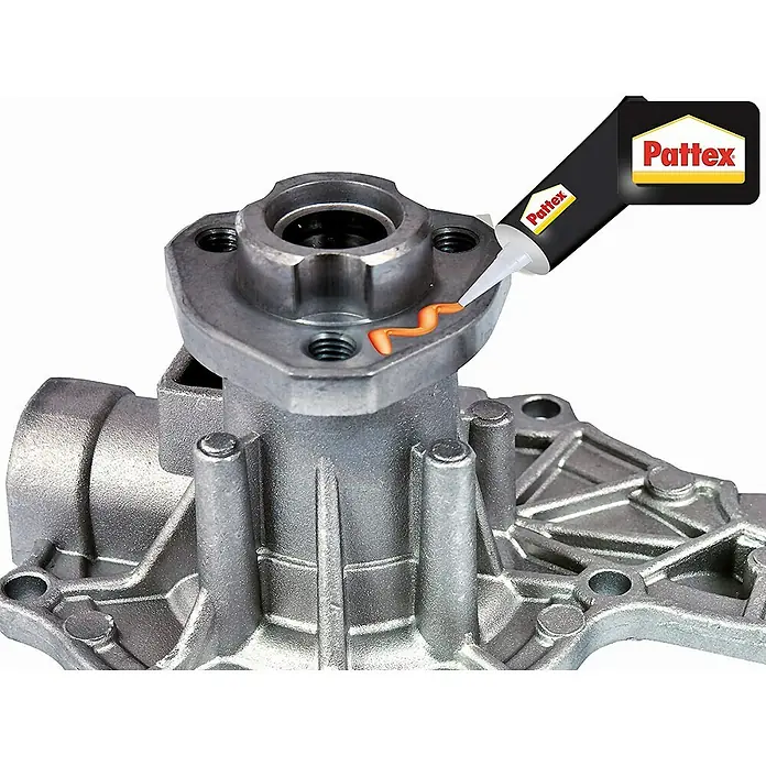 Pattex Adhesivo para juntas Nural 28 - 0,4 g - Primer plano de una pieza de máquina plateada con sellador Pattex aplicado para un sellado seguro y duradero.