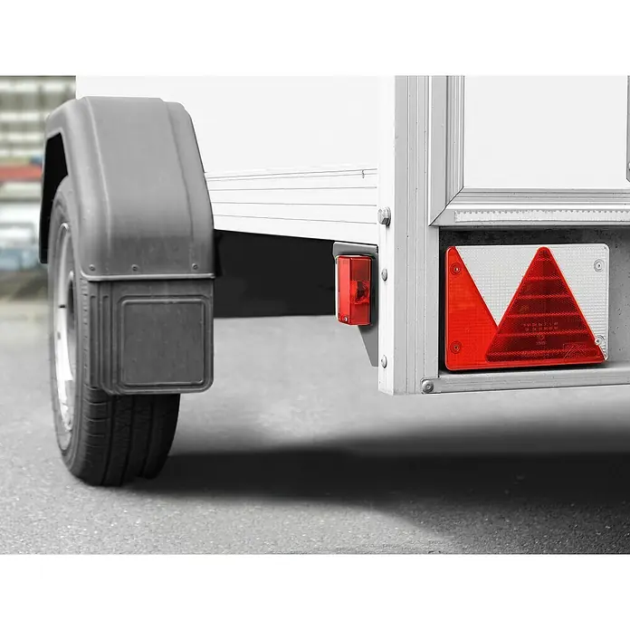 LAS Begrenzungsleuchte - 1 Stk., Rot - Nahaufnahme eines Anhängers mit Rückleuchte und Reflektor, der die Verkehrssicherheit erhöht.