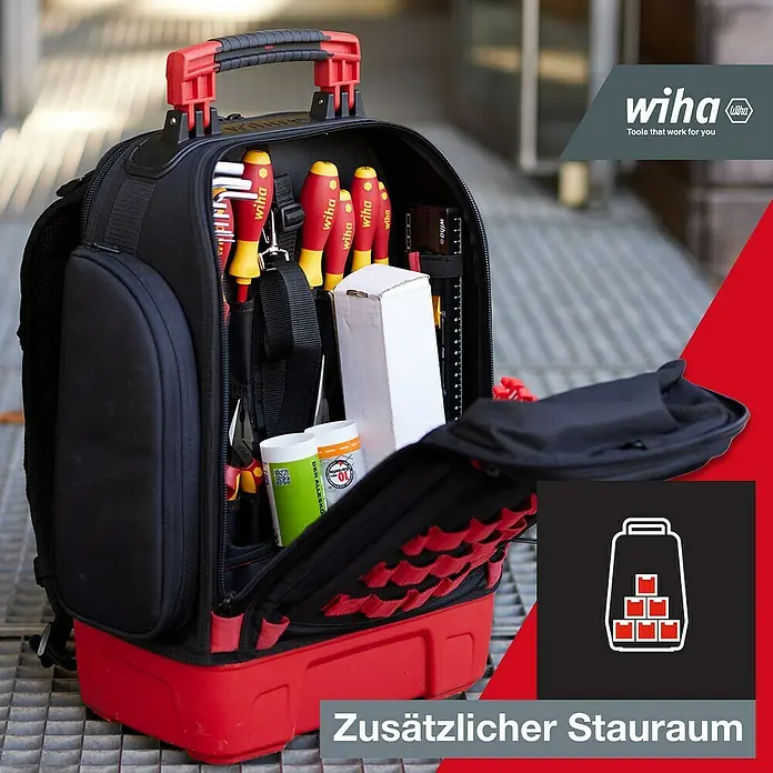 Wiha Werkzeugrucksack ELECTRIC - 28 -tlg. - Wiha Werkzeugrucksack mit geöffnetem Hauptfach, gefüllt mit Werkzeugen und Zubehör, der zusätzlichen Stauraum bietet.