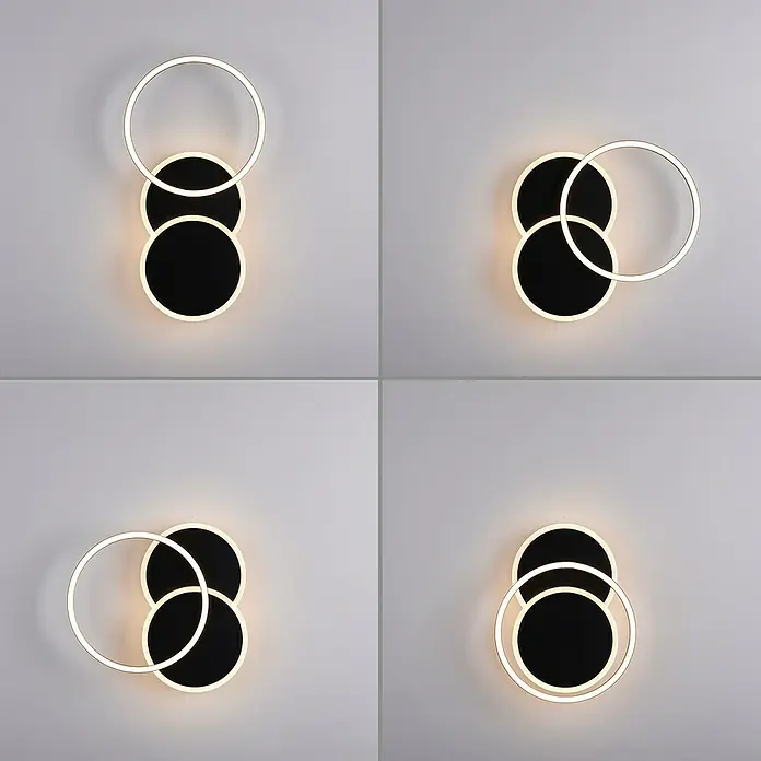Just Light LED-Deckenleuchte SEVENT - 29 W, L x B x H: 50 x 33,4 x 8,2 cm, Schwarz, Warmweiß - Dieses Bild zeigt eine moderne Wandleuchte mit einem Kreis und zwei Scheiben in verschiedenen Konfigurationen an einer Wand.