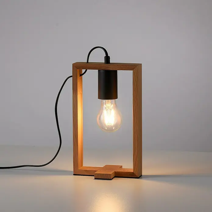 Just Light Tischleuchte FRANKY - L x B x H: 15 x 10 x 28,5 cm, Schwarz, E27 - Eine moderne Tischleuchte mit einem Holzrahmen und einer freiliegenden Glühbirne, die ein warmes Licht ausstrahlt.
