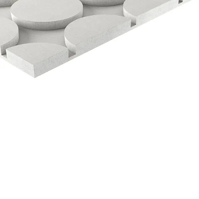 Fermacell Fußbodenheizelement Therm25 - 500 x 500 x 25 mm, Rundnuten - Nahaufnahme einer weißen, strukturierten Wandplatte mit Kreis- und Halbkreisformen für moderne Wandgestaltung und Innenarchitektur.