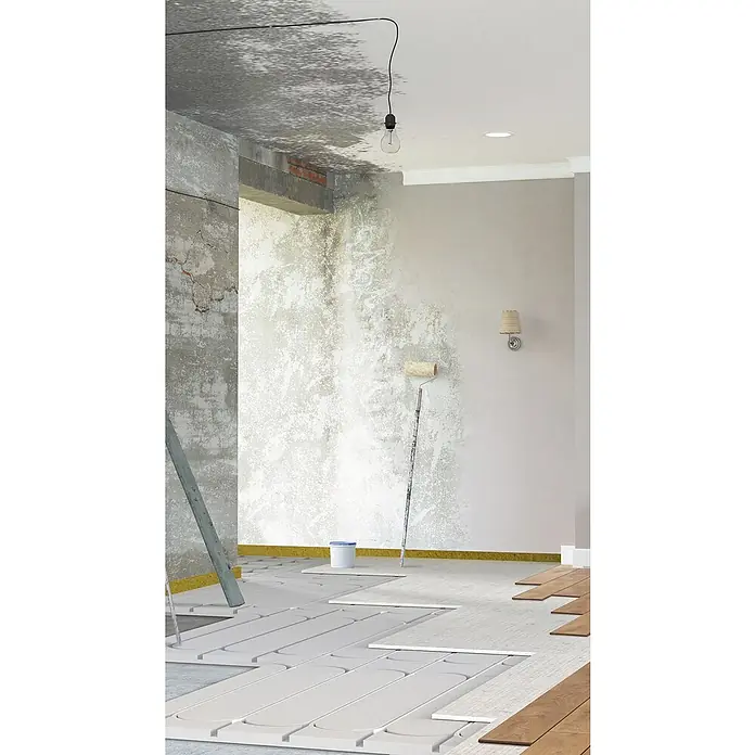 Fermacell Fußbodenheizelement Therm25 - 1.000 x 500 x 25 mm, Längs- und Umlenknuten - Bild einer Renovierung mit Fußbodenheizung, Farbe und einer einzelnen Glühbirne, die von der Decke hängt.