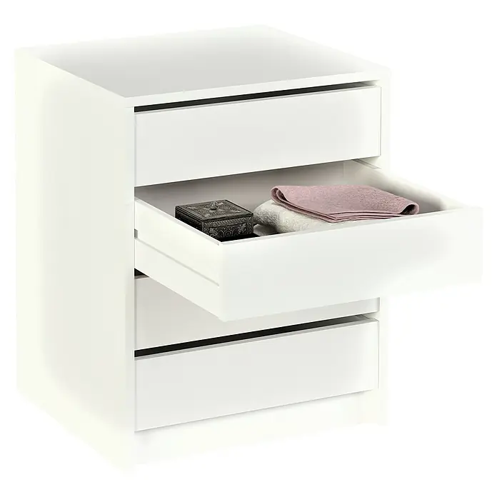 Meka Block Cajonera K-9463 - L x An x Al: 44 x 50 x 61,4 cm, Blanco, Número de cajones: 4 ud. - Una mesita de noche blanca con tres cajones, el cajón central está parcialmente abierto y muestra ropa de cama y un joyero.