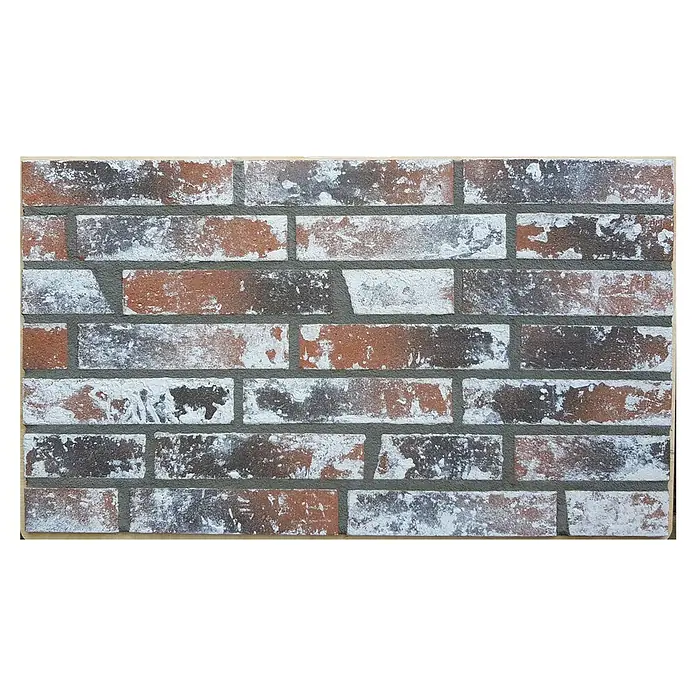 Celina Klinker Verblendstein Vintage Brooklyn - 5,2 x 24 cm, Rot/Weiß, Steinoptik - Nahaufnahme einer dekorativen Wandverkleidung aus Backsteinen mit weißer Patina und grauen Fugen für den Innenbereich.