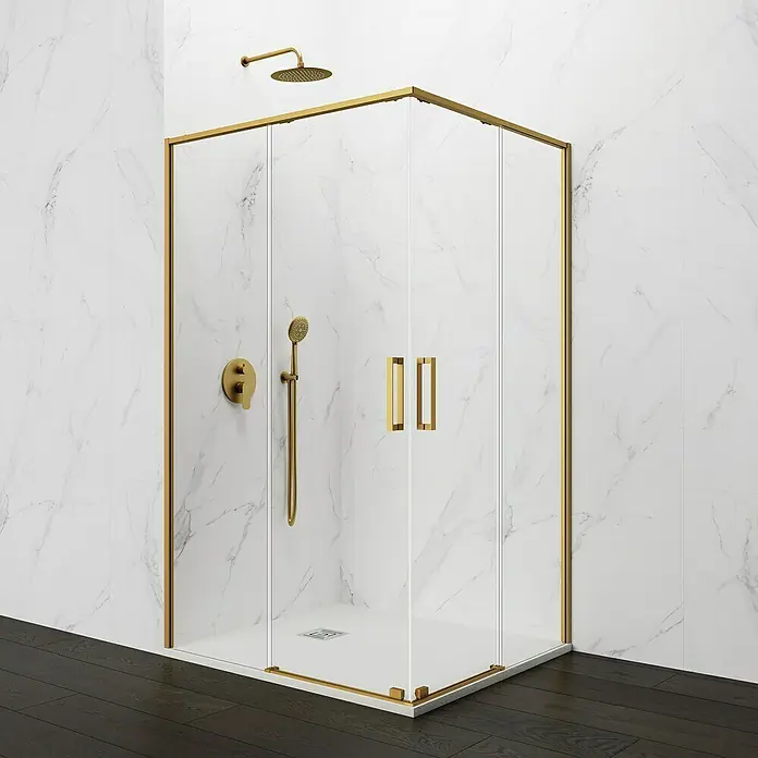 GME Mampara de ducha esquinera Twenty Angular - L x An x Al: 70 x 70 x 195 cm, Vidrio transparente, Oro - Elegante cabina de ducha con marcos y accesorios dorados frente a una pared de mármol y suelo de madera oscura. Diseño de baño elegante.