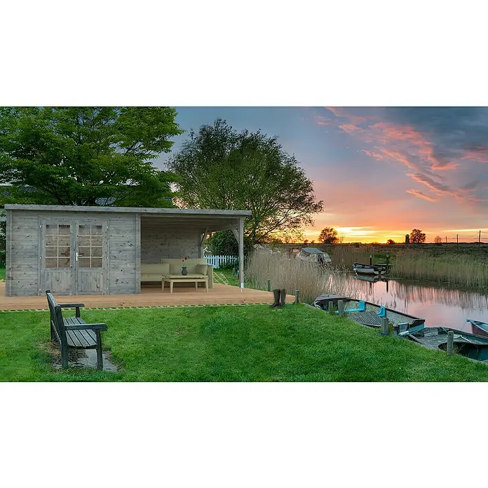 Palmako Gartenhaus Ella - Außenmaß inkl. Dachüberstand (B x T): 614 x 340 cm, 16,8 m², Holz, Transparent - Das Holzgartenhaus mit Terrasse lädt zum Verweilen ein und bietet einen schönen Blick auf den Fluss bei Sonnenuntergang.