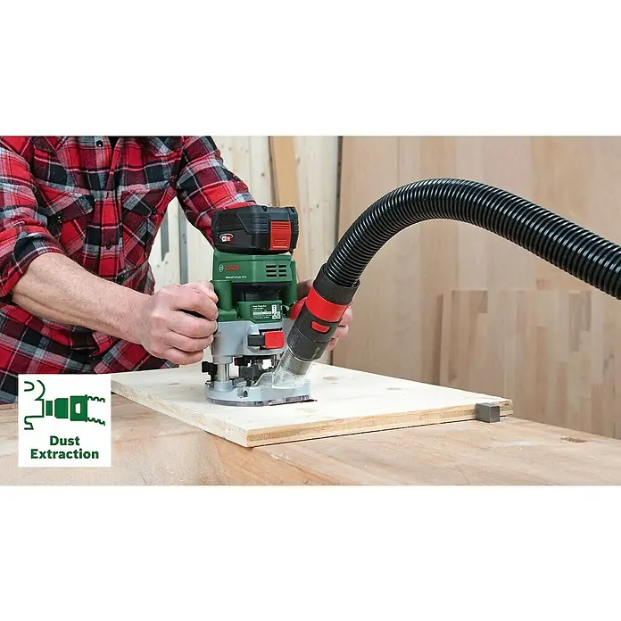 Bosch Power for All 18V Akku-Kantenfräser AdvancedTrimRouter 18V-8 Set - Ohne Akku, Leerlaufdrehzahl: 10.000 U/min - 30.000 U/min - Der Bosch AdvancedTrimRouter 18V-8, ein Akku-Kantenschneider, wird an einem Holztisch mit einer Staubabsaugung verwendet.