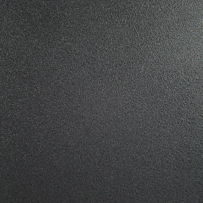 Splendoor Oberflächenmuster - Passend für: Splendoor Haustüren Thermodoor PLUS Anthrazitgrau Feinstruktur - Nahaufnahme einer schwarzen, strukturierten Oberfläche, die ein modernes und minimalistisches Design betont.