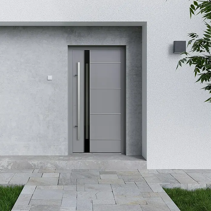 Gerda Haustür Thermo Prime 75 Rodan100 cm x 210 mm, DIN Anschlag: Links, Grau, Details in Edelstahl - Moderne graue Haustür mit elegantem Design und langem Griff, eingebettet in eine stilvolle Fassade.