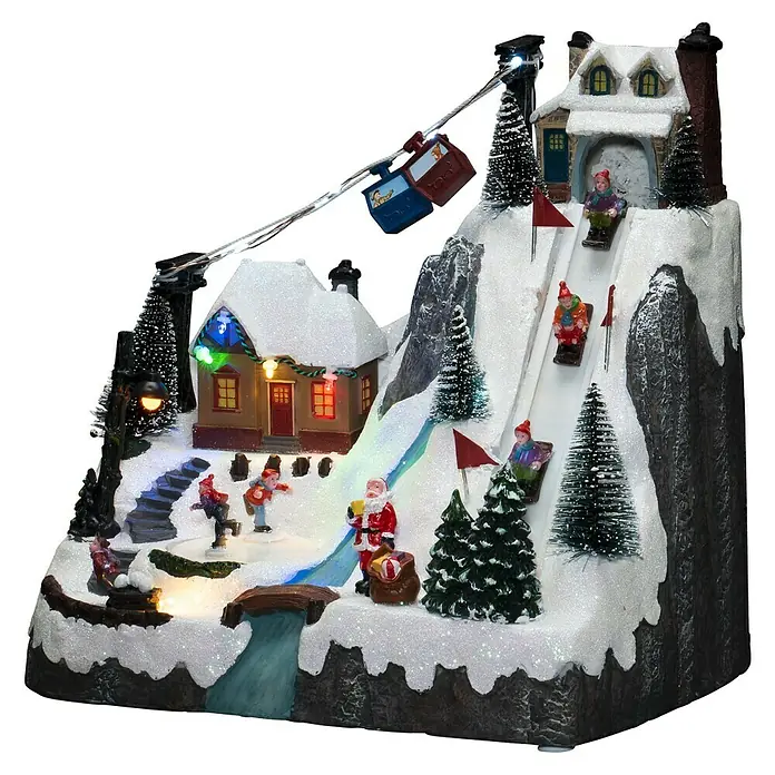 Konstsmide LED-Szenerie Skipiste - L x B x H: 29 x 20,5 x 28 cm, Bunt, Batteriebetrieben, LED - Detailreiche Weihnachtsdorf-Szene mit Skilift, Schlittenfahrern und beleuchteten Häusern, die eine festliche Atmosphäre schafft.
