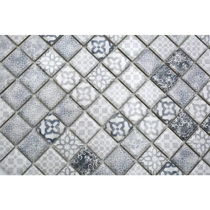 Mosaikfliese JAB 23PV02 grey - 29,7 x 29,7 cm, Grau, Matt - Nahaufnahme eines Musters aus quadratischen Vintage-Fliesen in Grau- und Blautönen mit filigranen Ornamenten, ideal für stilvolle Akzente.