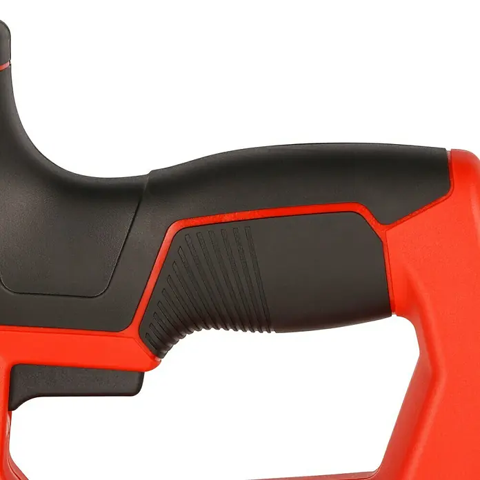 Einhell Elektrotacker - Klammertiefe: 6 mm - 14 mm - Nahaufnahme des Griffs eines Elektrowerkzeugs in Schwarz und Rot, das für einen sicheren Halt gerillt ist.