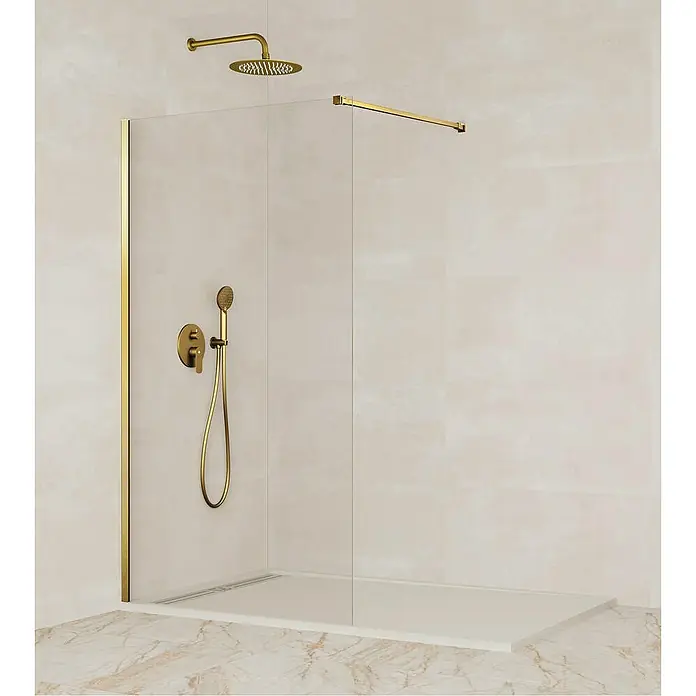 GME Mampara de ducha fija + brazo Screen - An x Al: 78 x 195 cm, Vidrio transparente, Oro - Un baño moderno con ducha a ras de suelo, accesorios dorados y pisos de mármol para un ambiente de lujo.